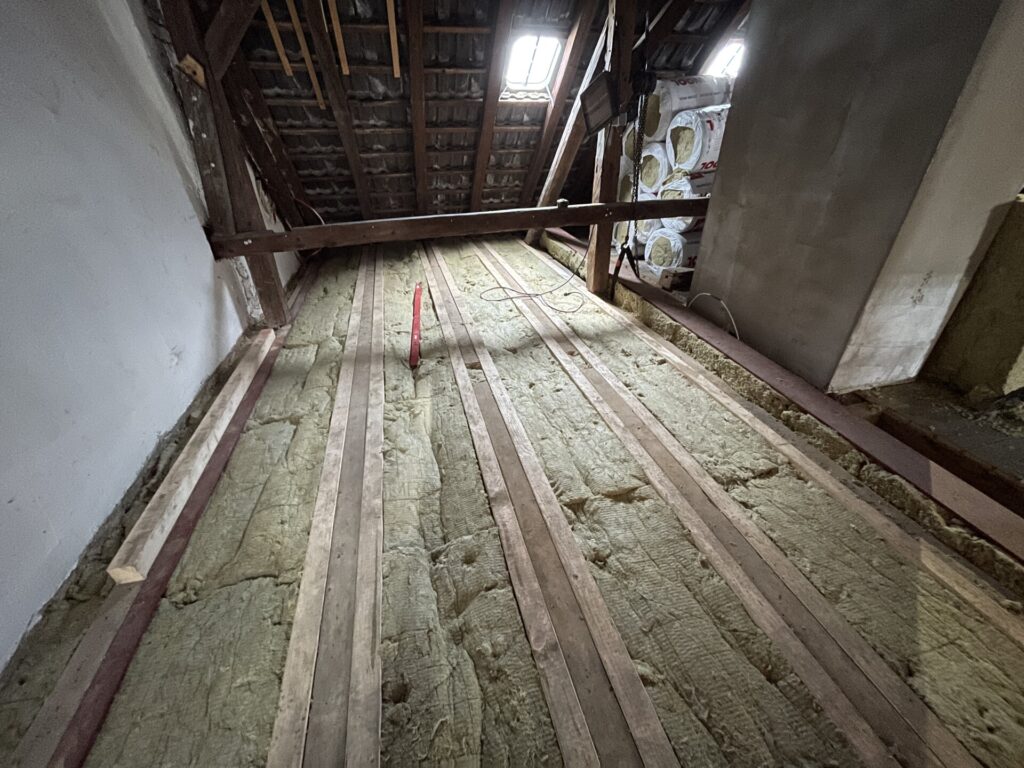 Sanierung und Wohnraumerweiterung eines Stadthauses mit Dachterrasse