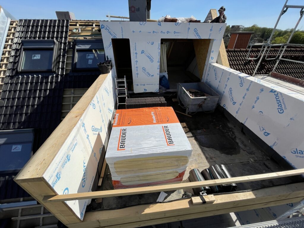 Sanierung und Wohnraumerweiterung eines Stadthauses mit Dachterrasse