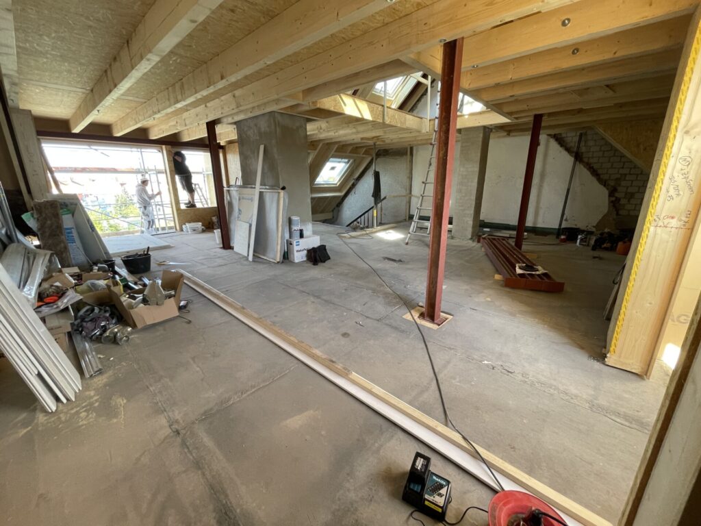 Sanierung und Wohnraumerweiterung eines Stadthauses mit Dachterrasse